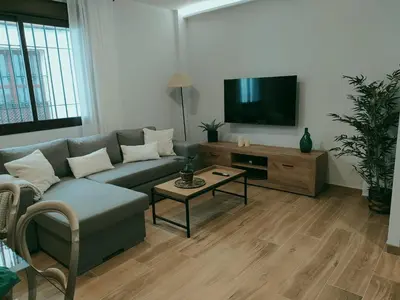 Una televisión o centro de entretenimiento en CASA UMBRAL DE LA MEZQUITA - a menos de 50 metros de la Mezquita Catedral