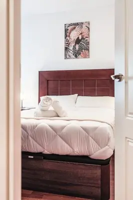 Cama o camas de una habitación en Centro y Estilo Apartamento cerca de la Alameda