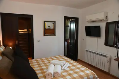 Cama o camas de una habitación en Casita Ladera, Setenil - Cádiz