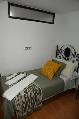 Cama o camas de una habitación en Casita Ladera, Setenil - Cádiz