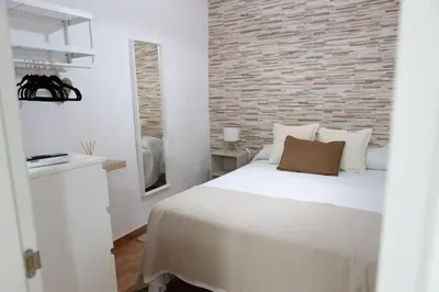 Cama o camas de una habitación en La casita de elle