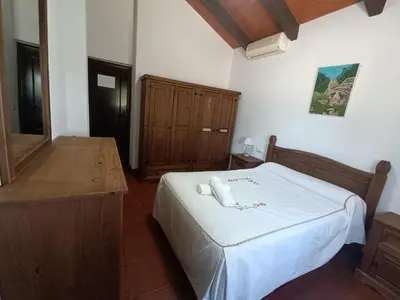 Cama o camas de una habitación en Casa Rural La Loba