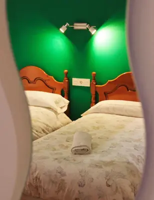 Cama o camas de una habitación en Hostal la zamora