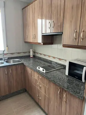 Una cocina o zona de cocina en CH Apartamentos Luque