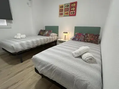 Cama o camas de una habitación en Modern and Bright close to the Station