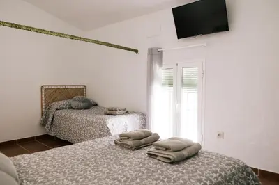 Cama o camas de una habitación en Casa Ochavada