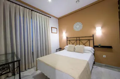 Cama o camas de una habitación en Hotel Los Omeyas