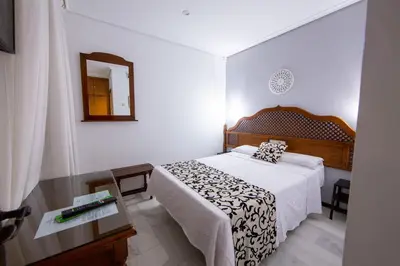Cama o camas de una habitación en Hotel Los Omeyas