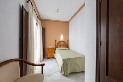 Cama o camas de una habitación en Hotel Los Omeyas
