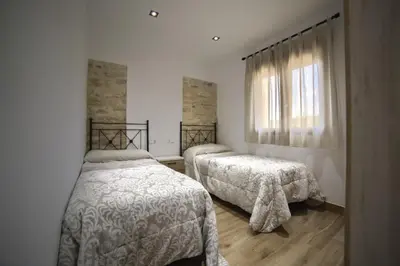 Cama o camas de una habitación en El Bujeo Montefrio