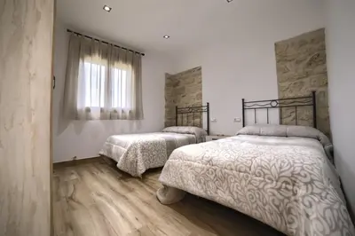 Cama o camas de una habitación en El Bujeo Montefrio