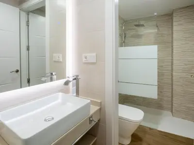 Un baño de Apartamentos La Fuensanta