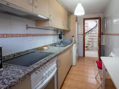 Una cocina o zona de cocina en BHost - Virrey