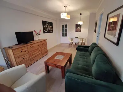 Una televisión o centro de entretenimiento en Apartamento Celia