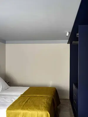 Cama o camas de una habitación en Azul & Limón Apartments