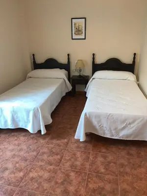 Cama o camas de una habitación en La Plaza