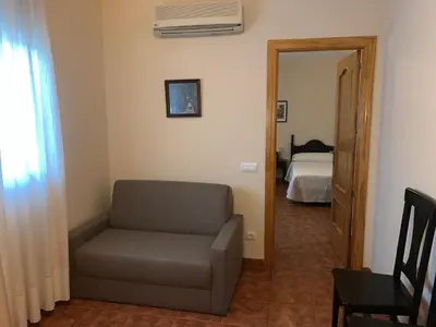 Cama o camas de una habitación en La Plaza