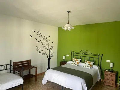 Cama o camas de una habitación en Villa Jardín