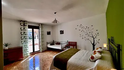 Cama o camas de una habitación en Villa Jardín