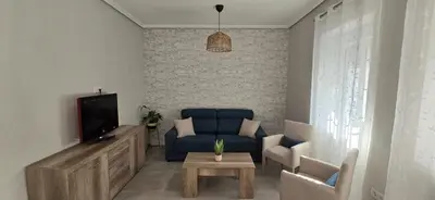 Una televisión o centro de entretenimiento en El balcón del puente romano