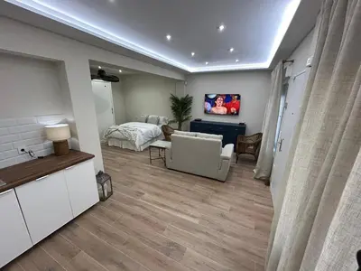 Cama o camas de una habitación en Pintor Espinosa 3 loft