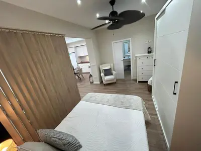 Cama o camas de una habitación en Pintor Espinosa 3 loft
