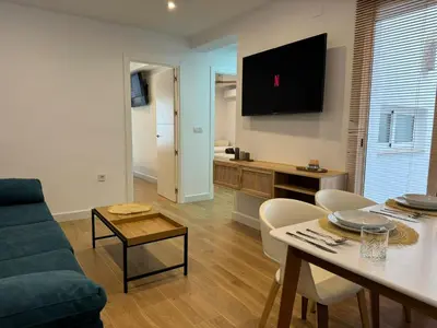 Una televisión o centro de entretenimiento en Balcón de los Patios con PARKING