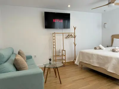 Cama o camas de una habitación en Balcón de los Patios con PARKING