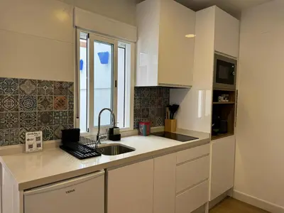 Una cocina o zona de cocina en Balcón de los Patios con PARKING