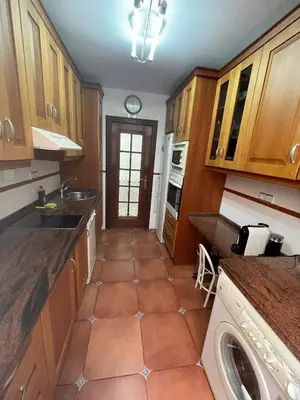 Una cocina o zona de cocina en Alojamiento Comercio.