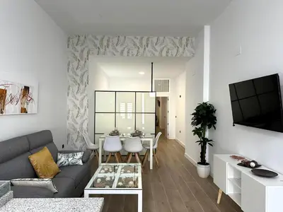 Una televisión o centro de entretenimiento en DS Ziryab Suites 2
