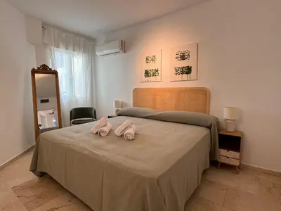 Cama o camas de una habitación en Apartamento Las Teresas Khalifa