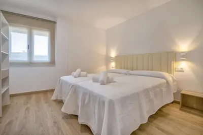 Cama o camas de una habitación en Apartamento Vizconde de Miranda & Parking incluido & Casco histórico