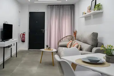Una televisión o centro de entretenimiento en ALCANTARA LOFT - alojamiento turístico