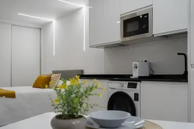 Una cocina o zona de cocina en ALCANTARA LOFT - alojamiento turístico