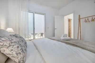 Cama o camas de una habitación en Apartamento Pozo Dos Bocas - Free Parking