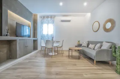 Una televisión o centro de entretenimiento en Apartamento Pozo Dos Bocas - Free Parking
