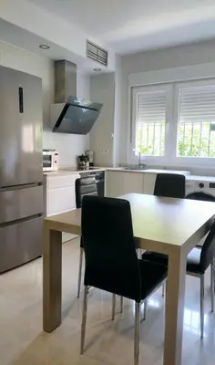Una cocina o zona de cocina en Nervion Luxury Sevilla