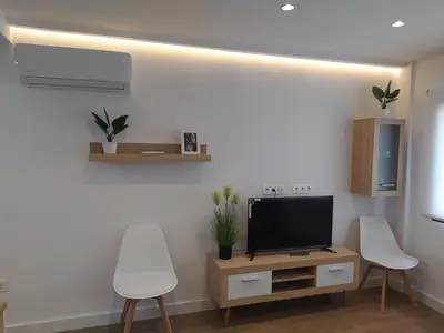 Una televisión o centro de entretenimiento en Alojamiento Los Alamos Dos dormitorios y Dos baños