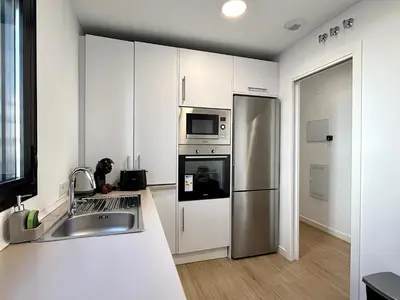 Una cocina o zona de cocina en San Cayetano Apartment