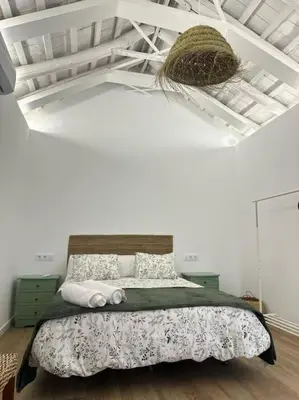 Cama o camas de una habitación en Casa en el centro de Arahal