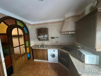 Una cocina o zona de cocina en La casita del Cabaña