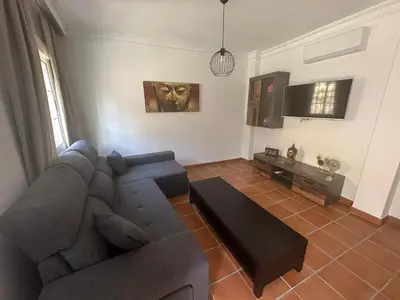 Zona de estar de La casita del Cabaña