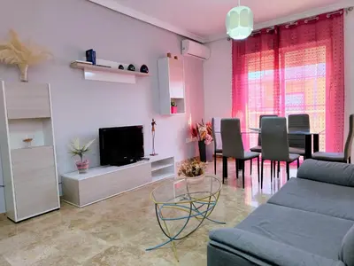 Zona de estar de Alojamiento La Palmera