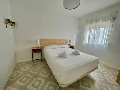 Cama o camas de una habitación en Geysotur Barrios