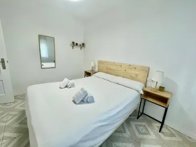 Cama o camas de una habitación en Geysotur Barrios
