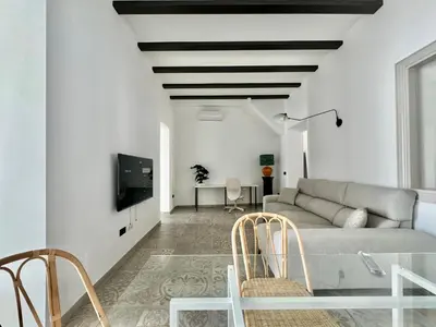 Una televisión o centro de entretenimiento en Piso con patio,mascotas aptas