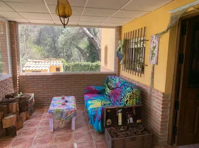 Zona de estar de La casita del Río Guadiato