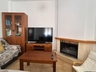 Una televisión o centro de entretenimiento en La Casita de Blanca