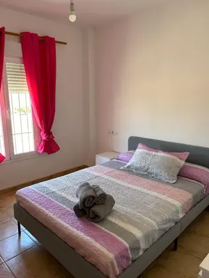 Cama o camas de una habitación en La Casita de Blanca